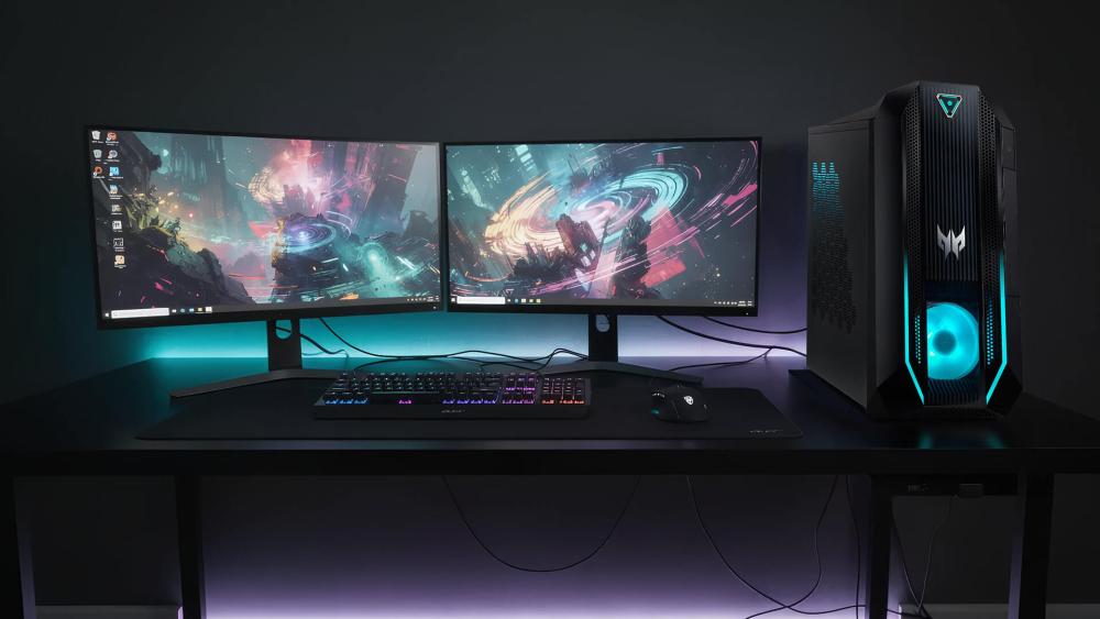Acer gaming tower with dual monitors in a RGB-lit setup