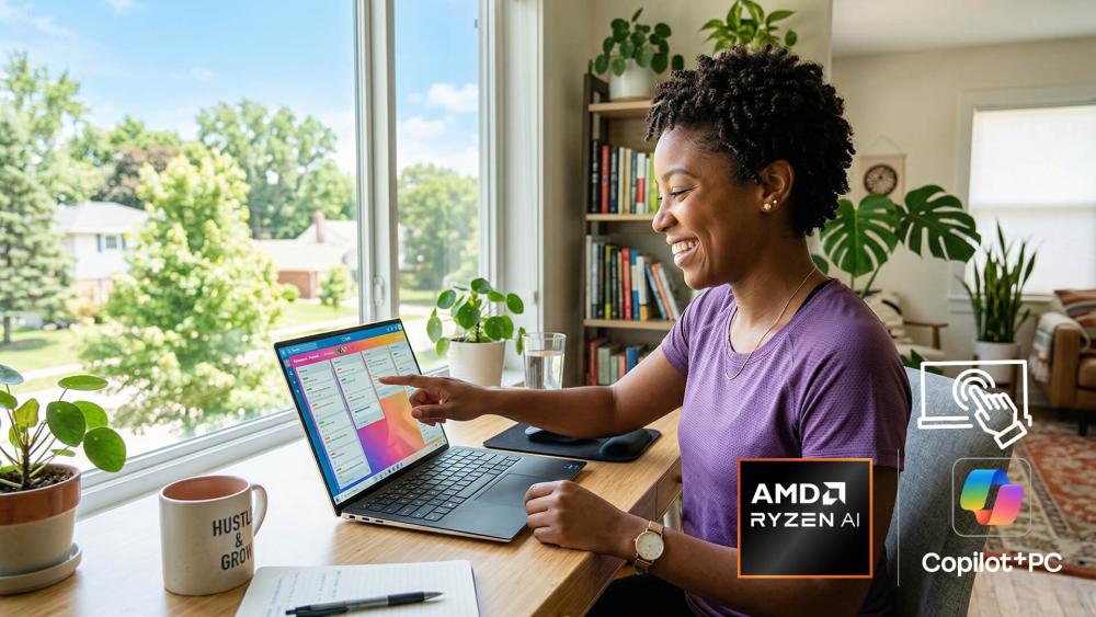 Professional using a touchscreen laptop powered by AMD Ryzen AI and Copilot+ PC features in a bright home office workspace.