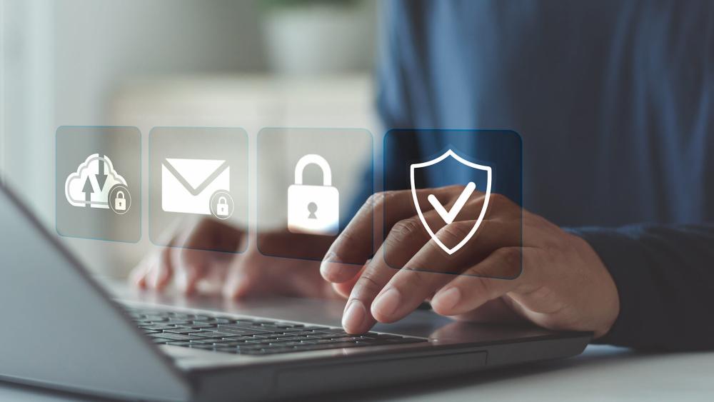 Business laptop security with data protection cloud email and lock icons
