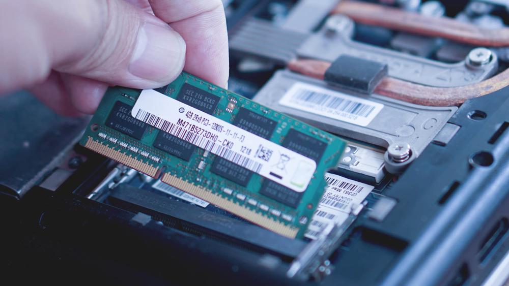 Close up of laptop RAM module during upgrade or replacement