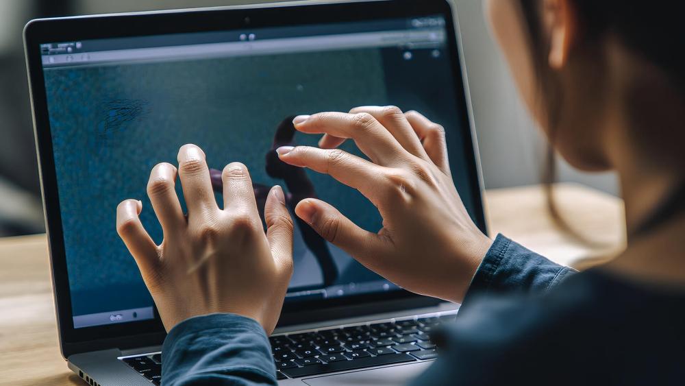 User checking touch function on an Asus Chromebook display