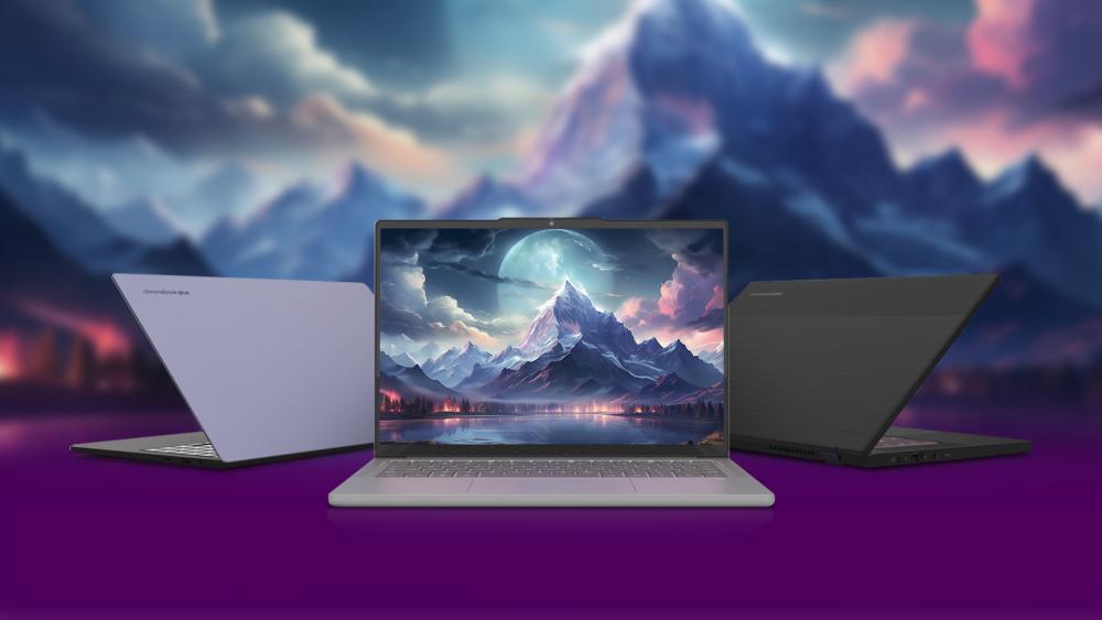 Three Chromebook Plus laptops displayed on a purple background, with the centre laptop open showing a mountain landscape wallpaper.