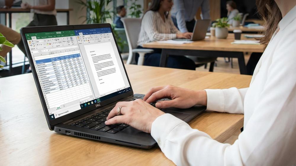 Dell Pro Essential 15 laptop used for office productivity tasks