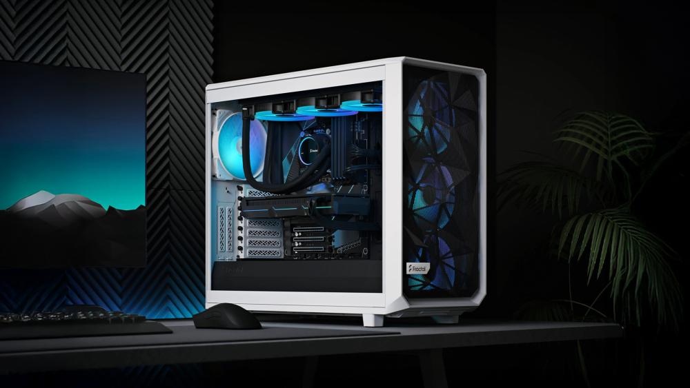 White Fractal Meshify case showing airflow-focused gaming setup