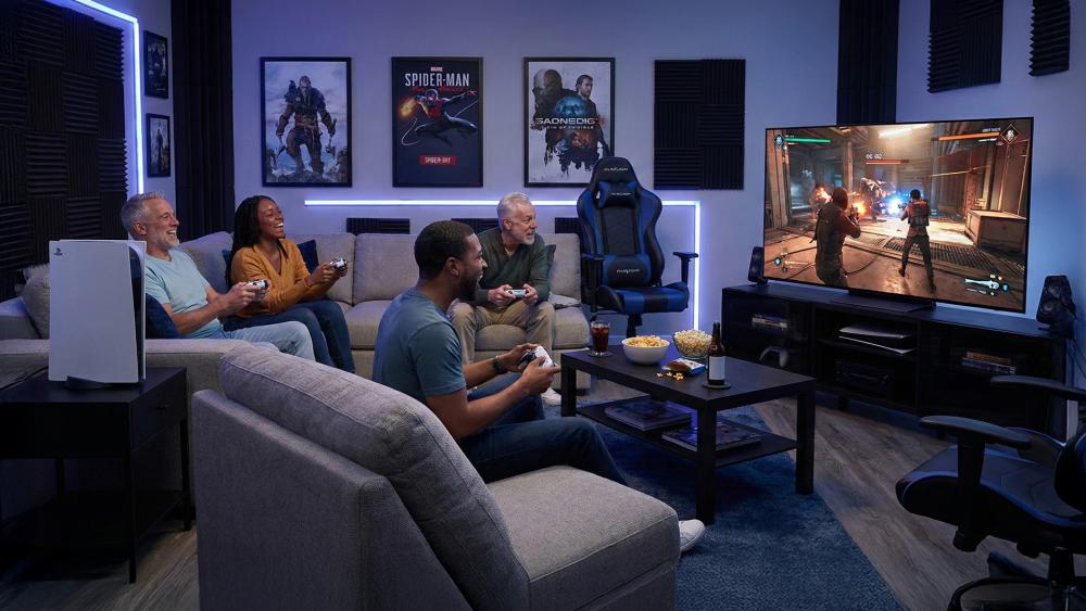 Friends playing console co-op on a big TV in living room