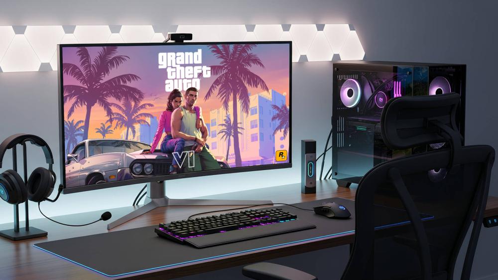 GTA 6 artwork displayed on a gaming setup with RGB PC