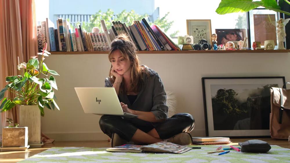 HP laptop made with recycled materials on a modern work desk