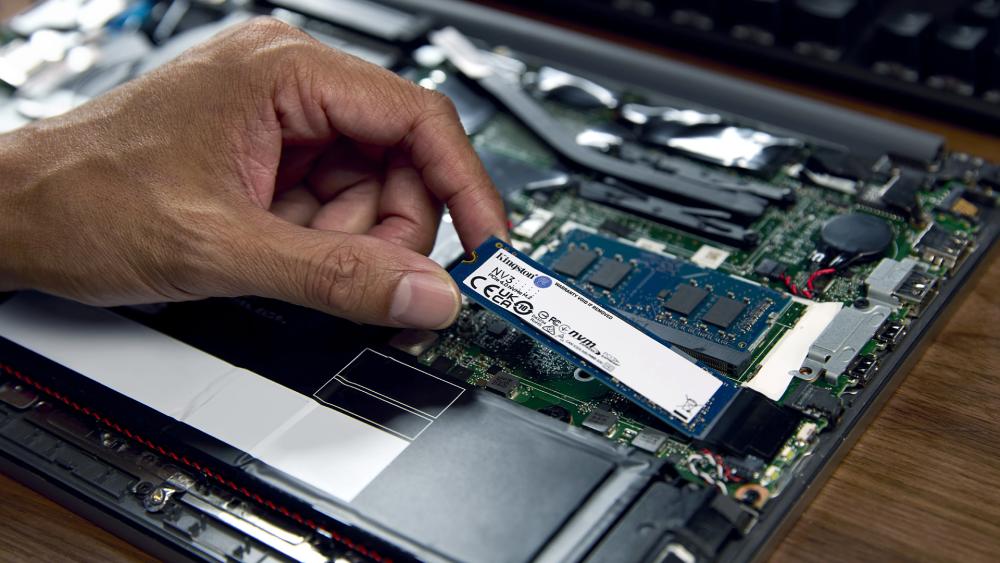 A close-up shot an NVMe drive on a motherboard M.2 slot