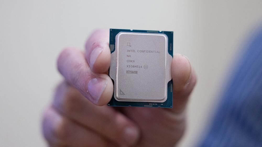 Intel Core Series 2 processor chip held in hand