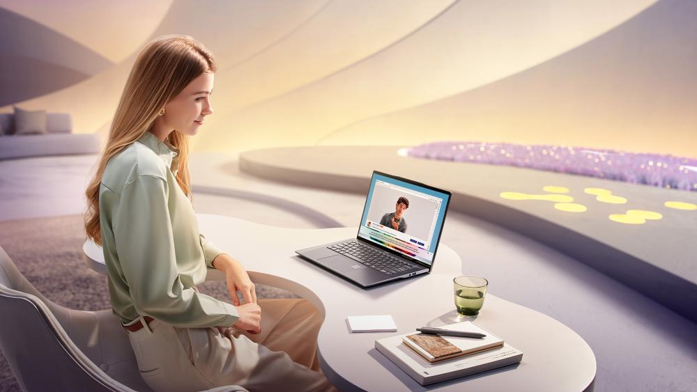 Woman using a laptop for a video call in a modern workspace, highlighting remote learning, communication and productivity
