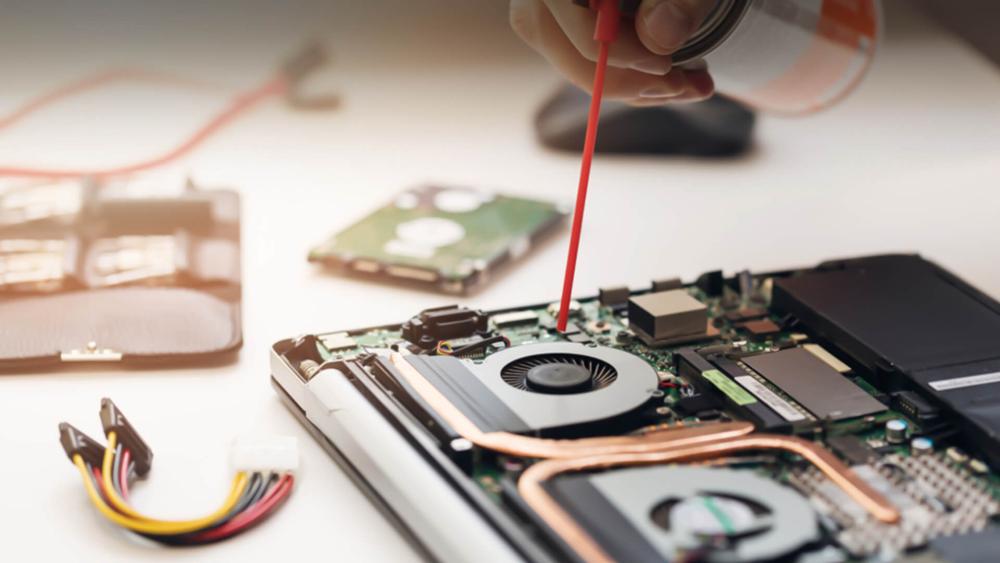 Cleaning a Lenovo laptop fan with compressed air