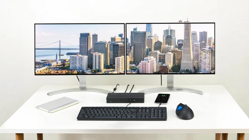 Dual monitor workstation setup connected via docking station