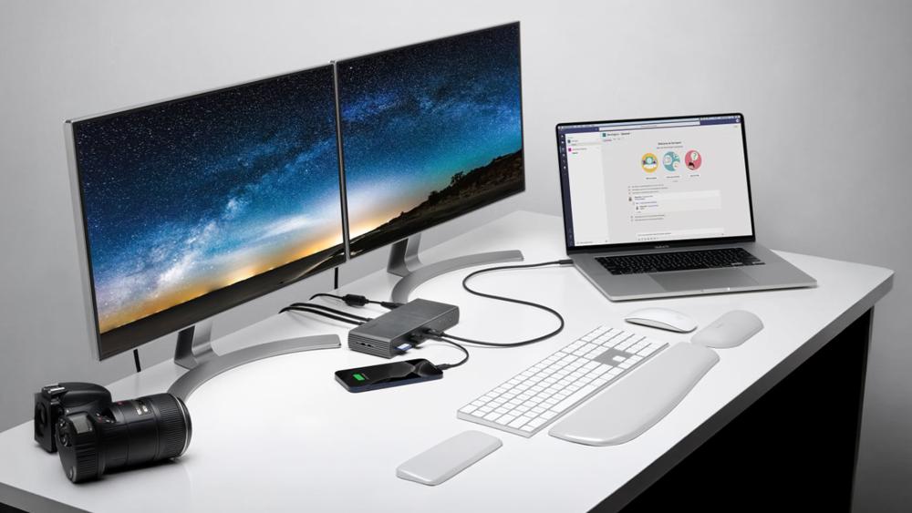 MacBook Air connected to dual monitors with docking station