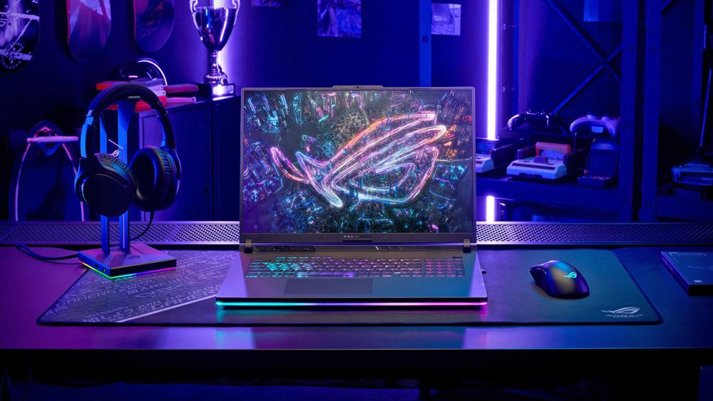 ASUS ROG Strix laptop on RGB gaming desk setup