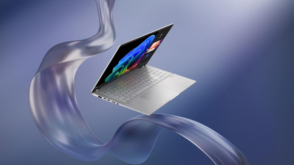 Slim lightweight laptop floating against a futuristic abstract background, showcasing modern design and vibrant display